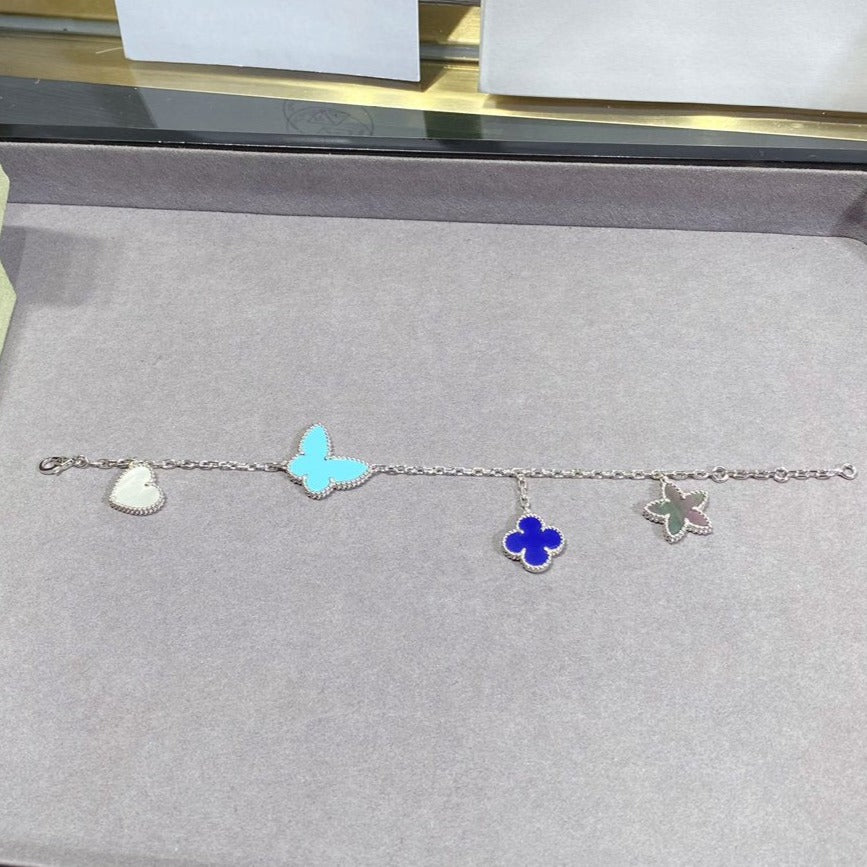 [NOVO] GLÜCKSFRÜHLINGS-SILBERARMBAND MIT 4 MOTIVEN