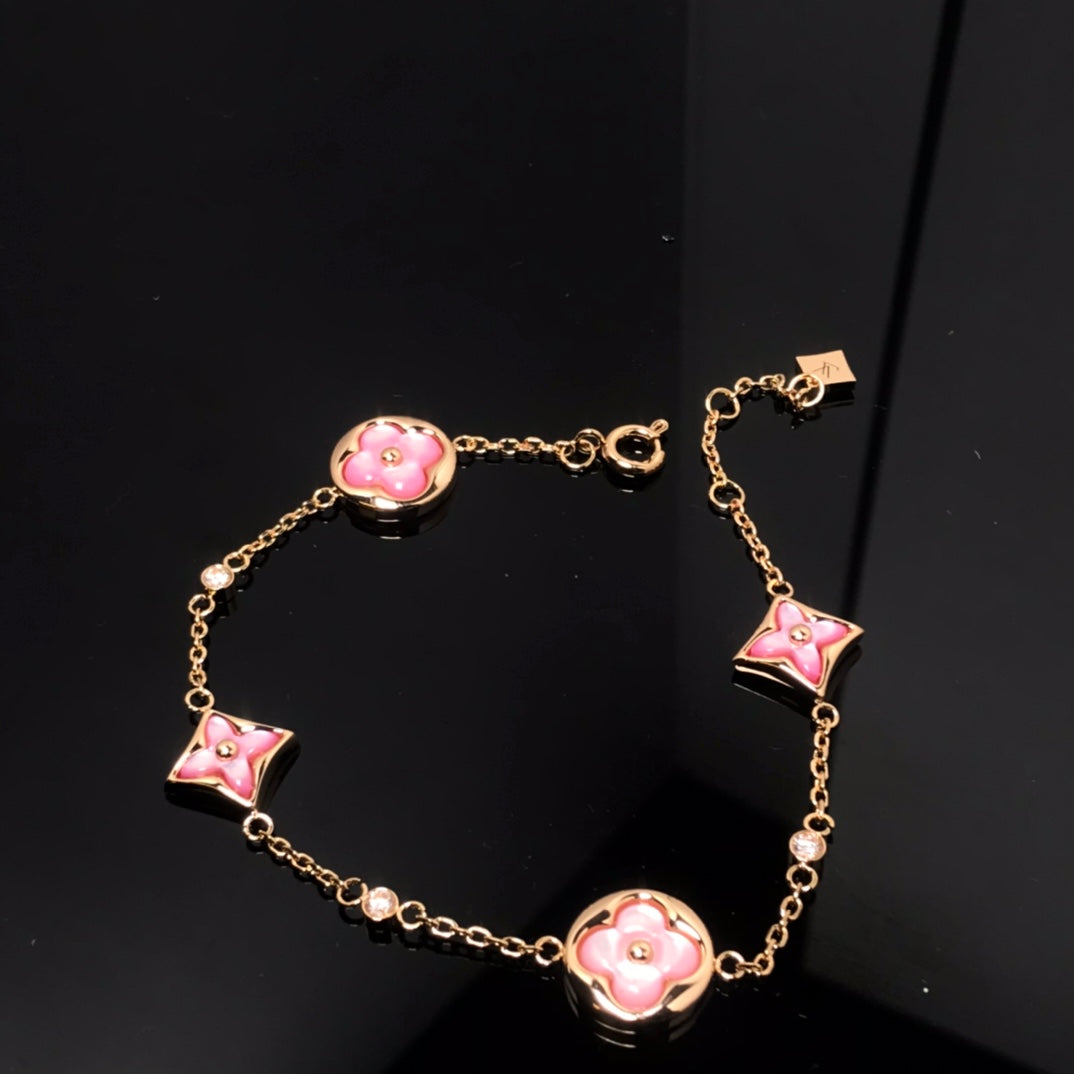 [NOVO]Stern- und Sonnenarmband mit 4 Motiven, rosa Mopp, rosa-goldenes Armband 