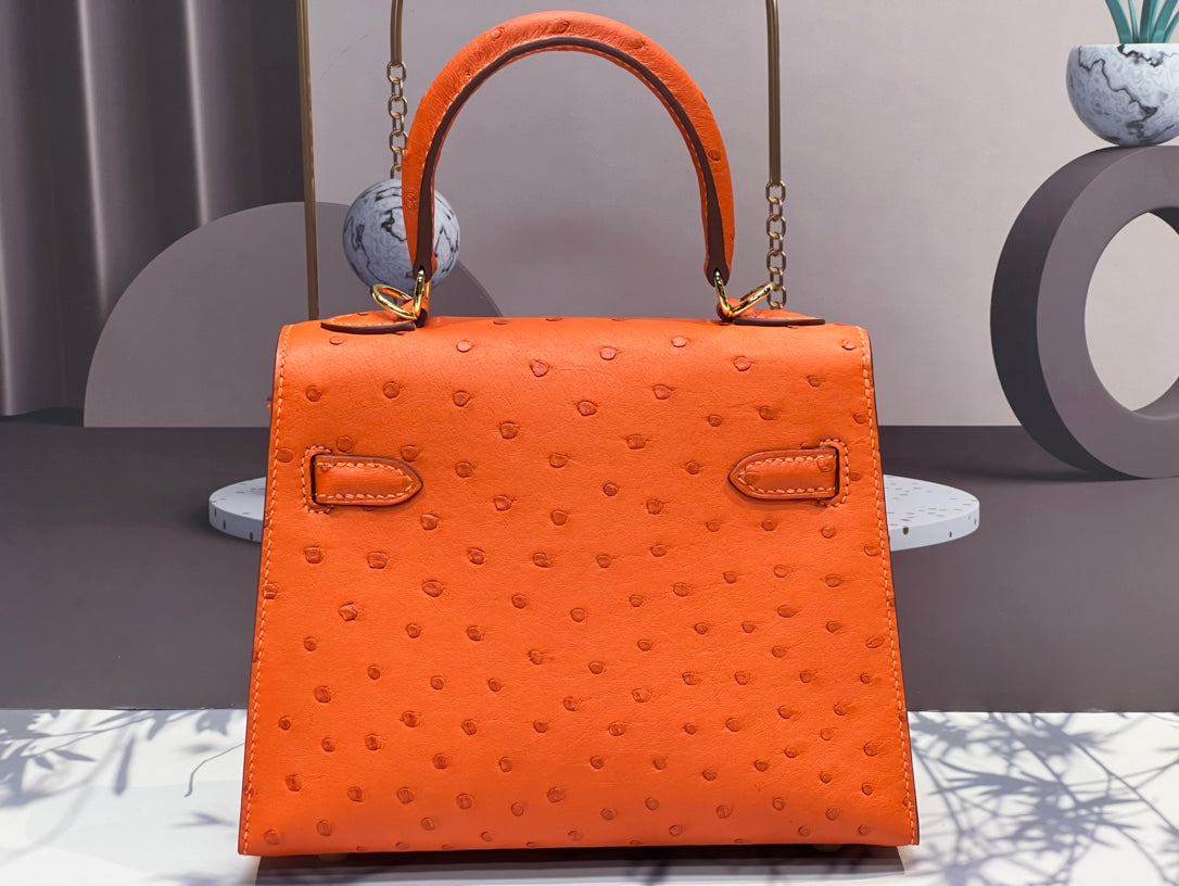 KELLY BAG 20 IN FIRE ORANGE OSTRICH LEATHER WITH GOLD HARDWARE (MADE - TO - ODER)