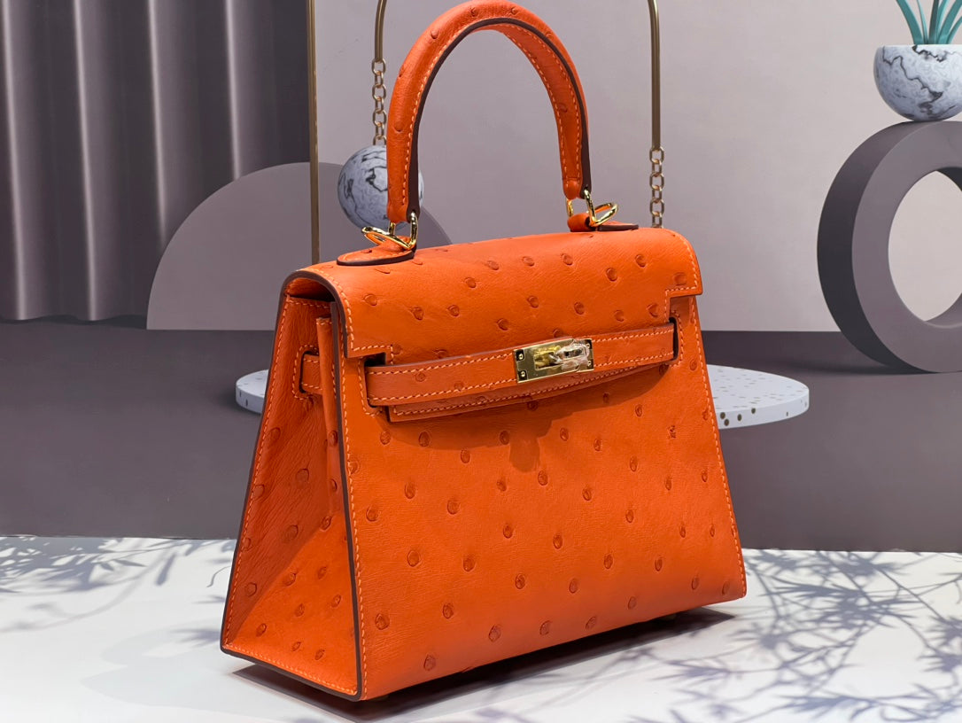 KELLY BAG 20 IN FIRE ORANGE OSTRICH LEATHER WITH GOLD HARDWARE (MADE - TO - ODER)