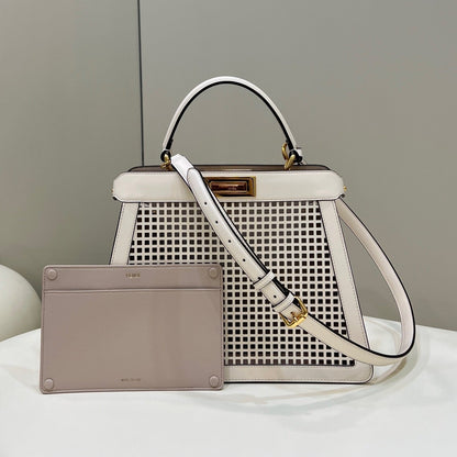 PEEKABOO ISEEU 34 IN WHITE PERFORATED CALFSKIN GOLD HARDWARE