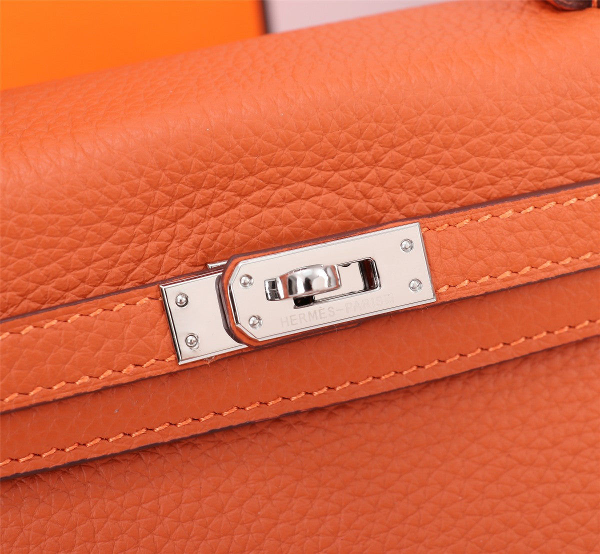 HM KELLY BAG 25 ORANGE TOGO SILVER HARDWARE