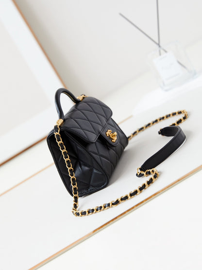 24a flap bag with top handle 18cm black lambskin gold hardware