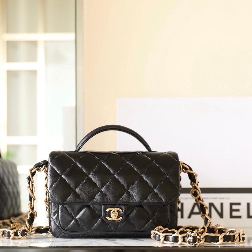 cc 24a flap bag 20cm top handle black  lambskin gold hardware