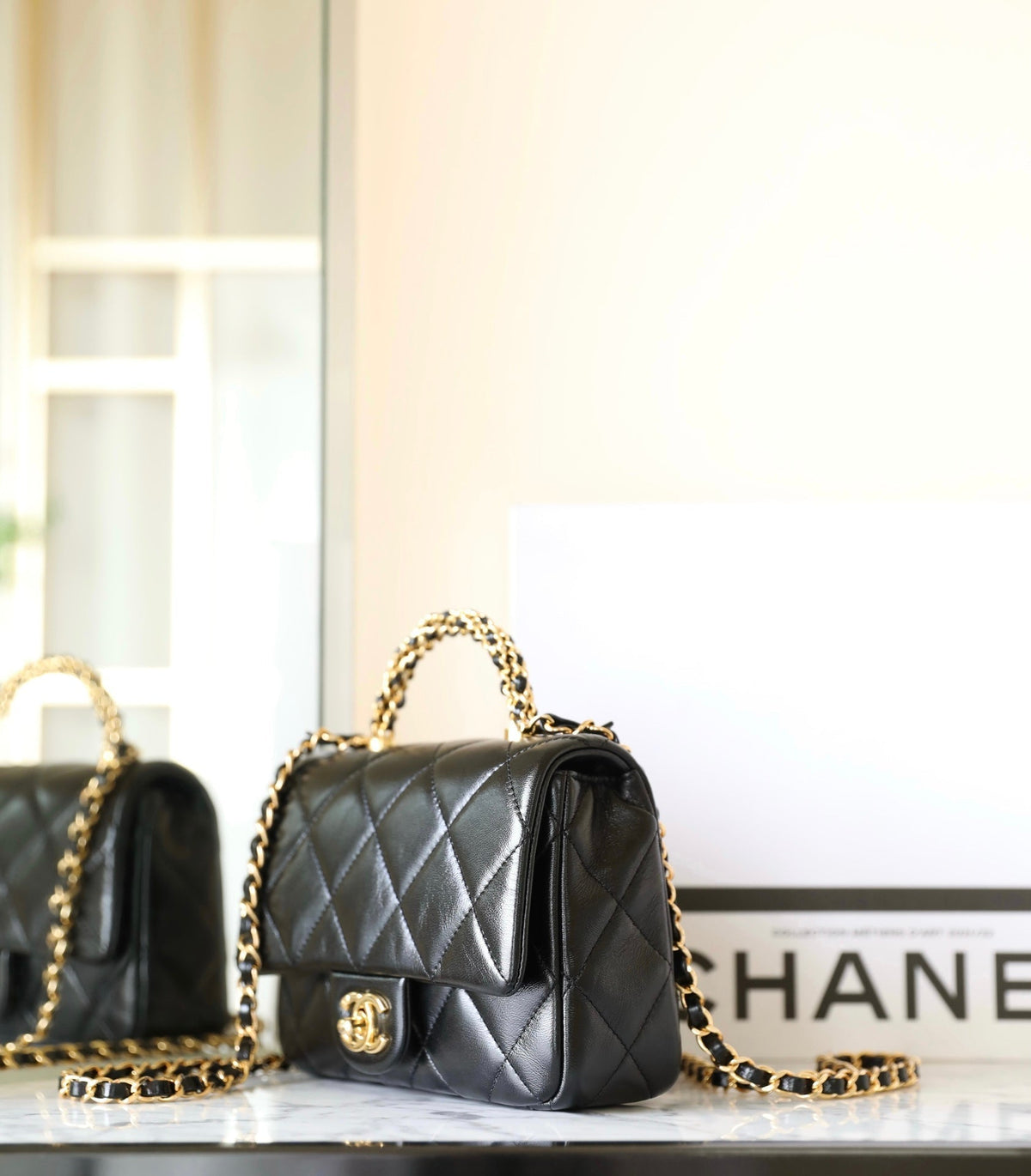 24B Mini Flap Bag With Top Handle 19cm Black Lambskin