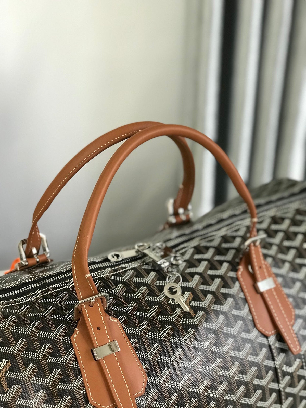 BOSTON 50 BAG IN BLACK GOYARDINE CANVAS AND TAN CALFSKIN TRIM